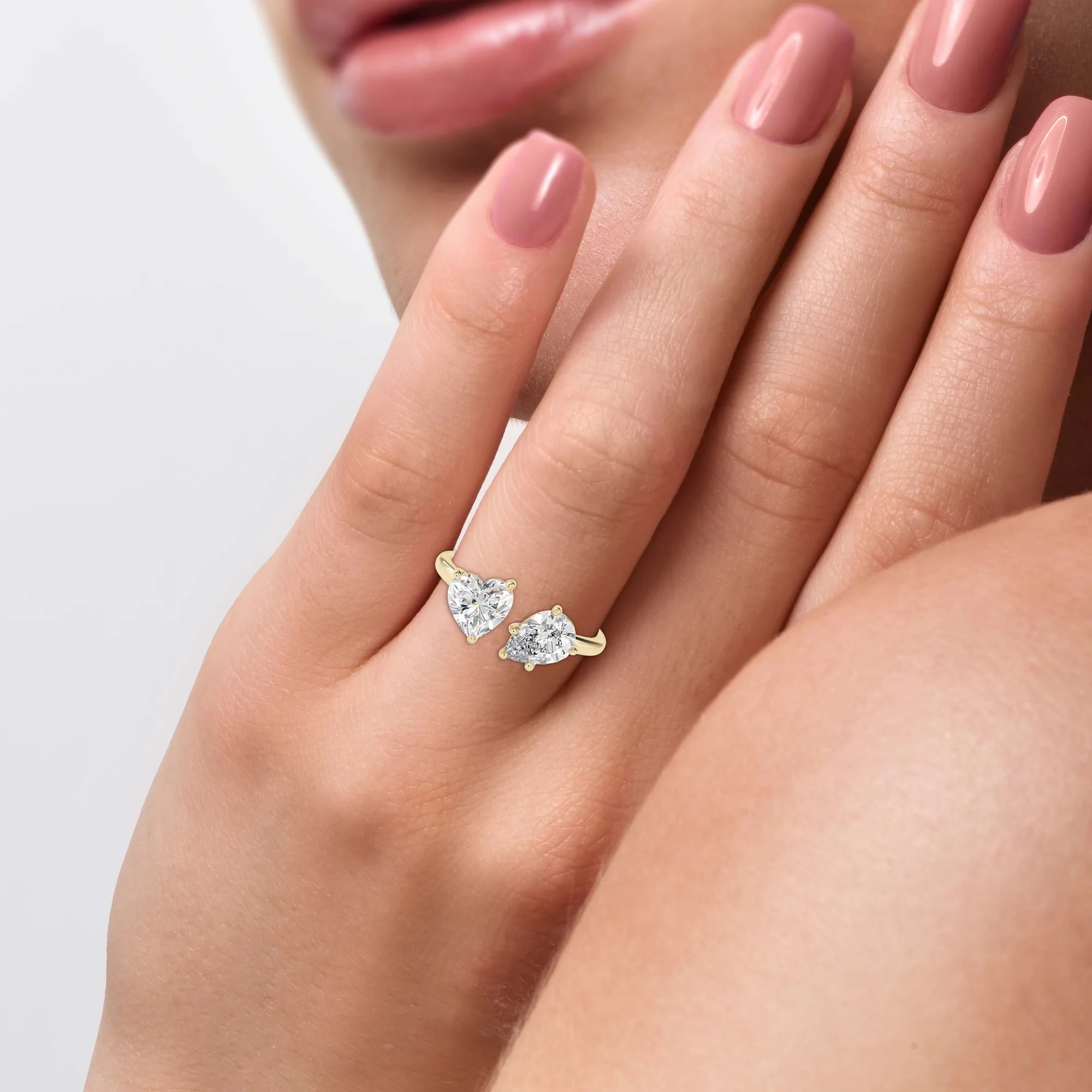 Heart-cut lab-grown diamond ring worn on a hand